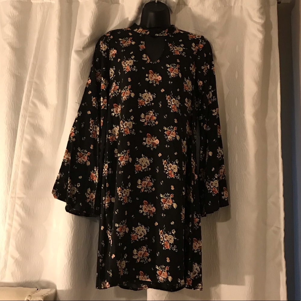 Swing dress with flute sleeves